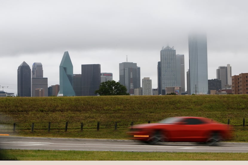 A foggy Dallas skyline in July 2014. (File Photo/David Woo)