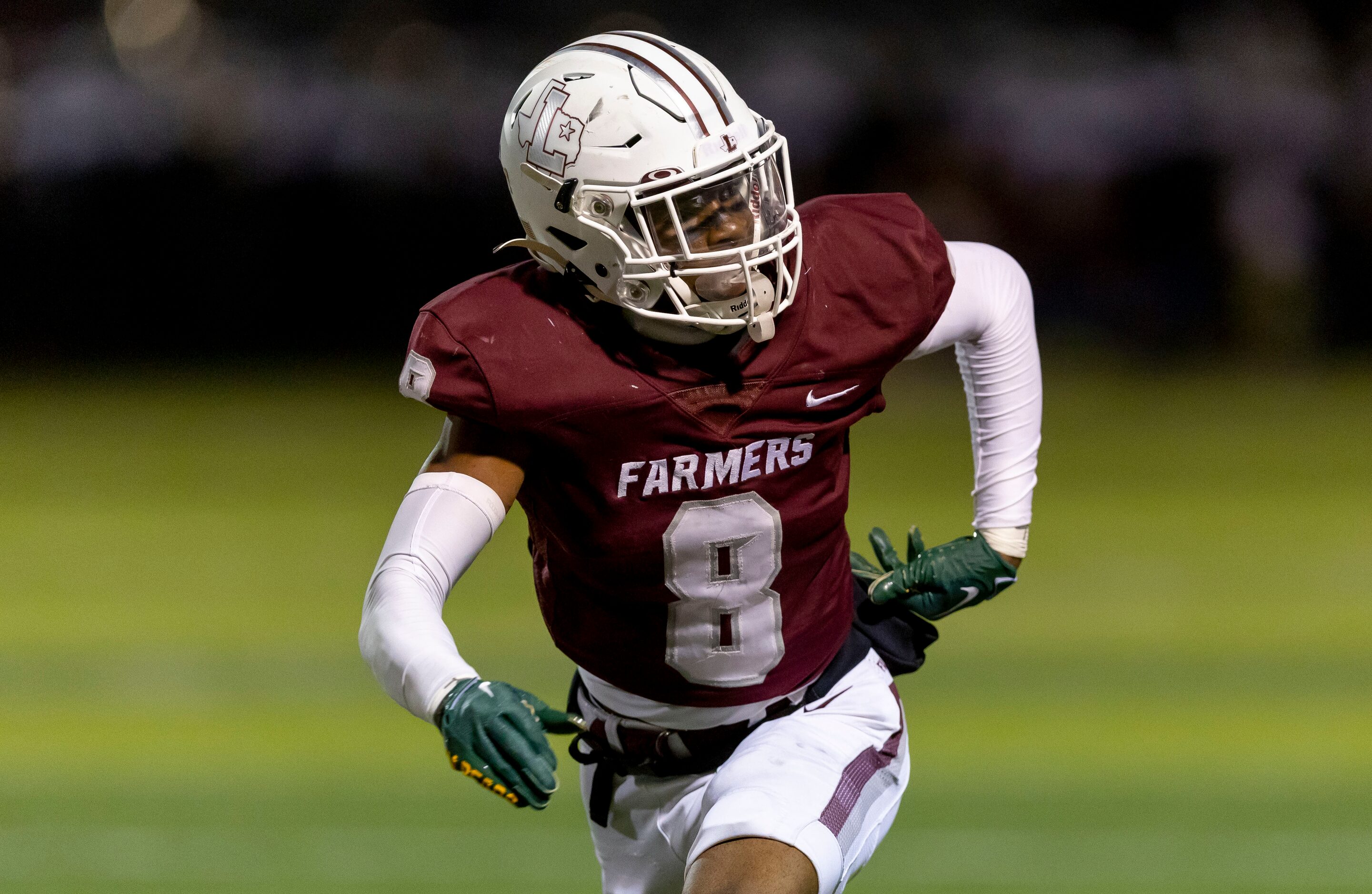 Lewisville senior defensive back Caden Jenkins (8) defends against Coppell during the first...