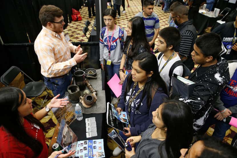 Alex Perales (top left) and Natalia Espino (bottom left) talk about engineering to students...