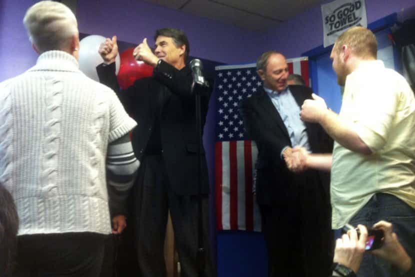 Gov. Rick Perry helped fire up voters on behalf of Republican Senate candidate Tom Smith on...