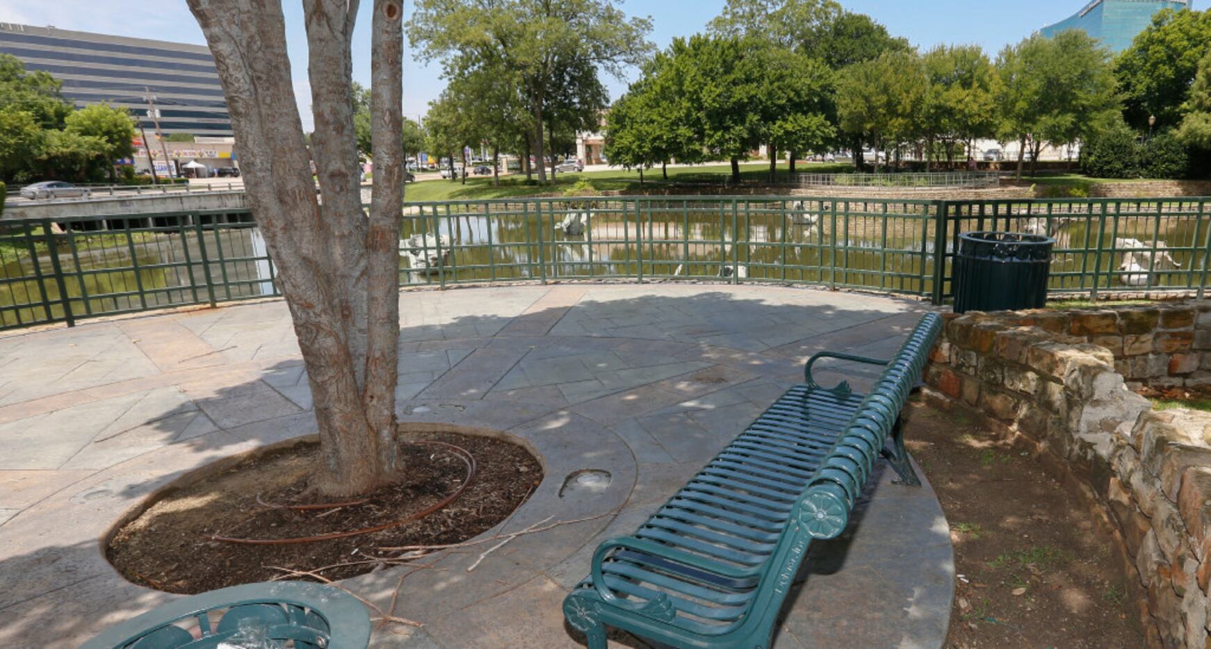 Benches are placed around one of the ponds at The Arbors shopping center located at the...