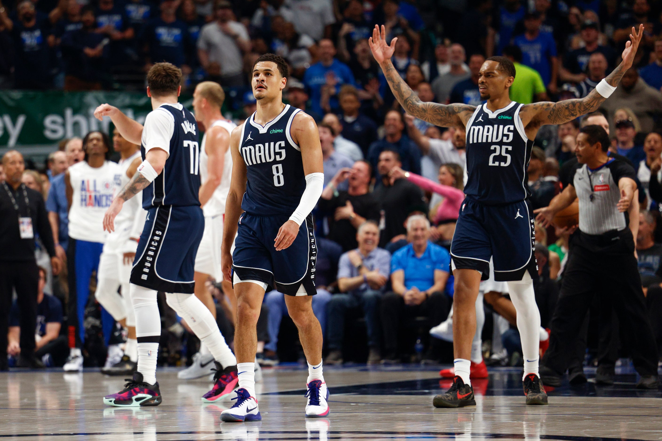 Dallas Mavericks forward P.J. Washington (25) reacts after Dallas Mavericks guard Josh Green...