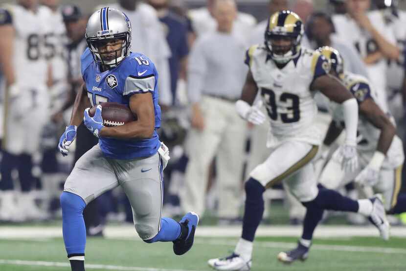 Detroit Lions' Golden Tate runs for a first down against the Los Angeles Rams during the...