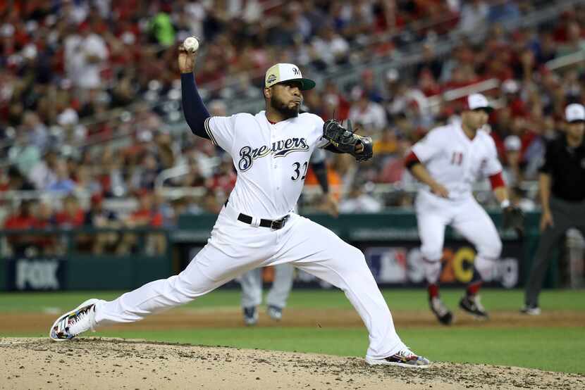 WASHINGTON, DC - JULY 17:  Jeremy Jeffress #32 of the Milwaukee Brewers and National League...