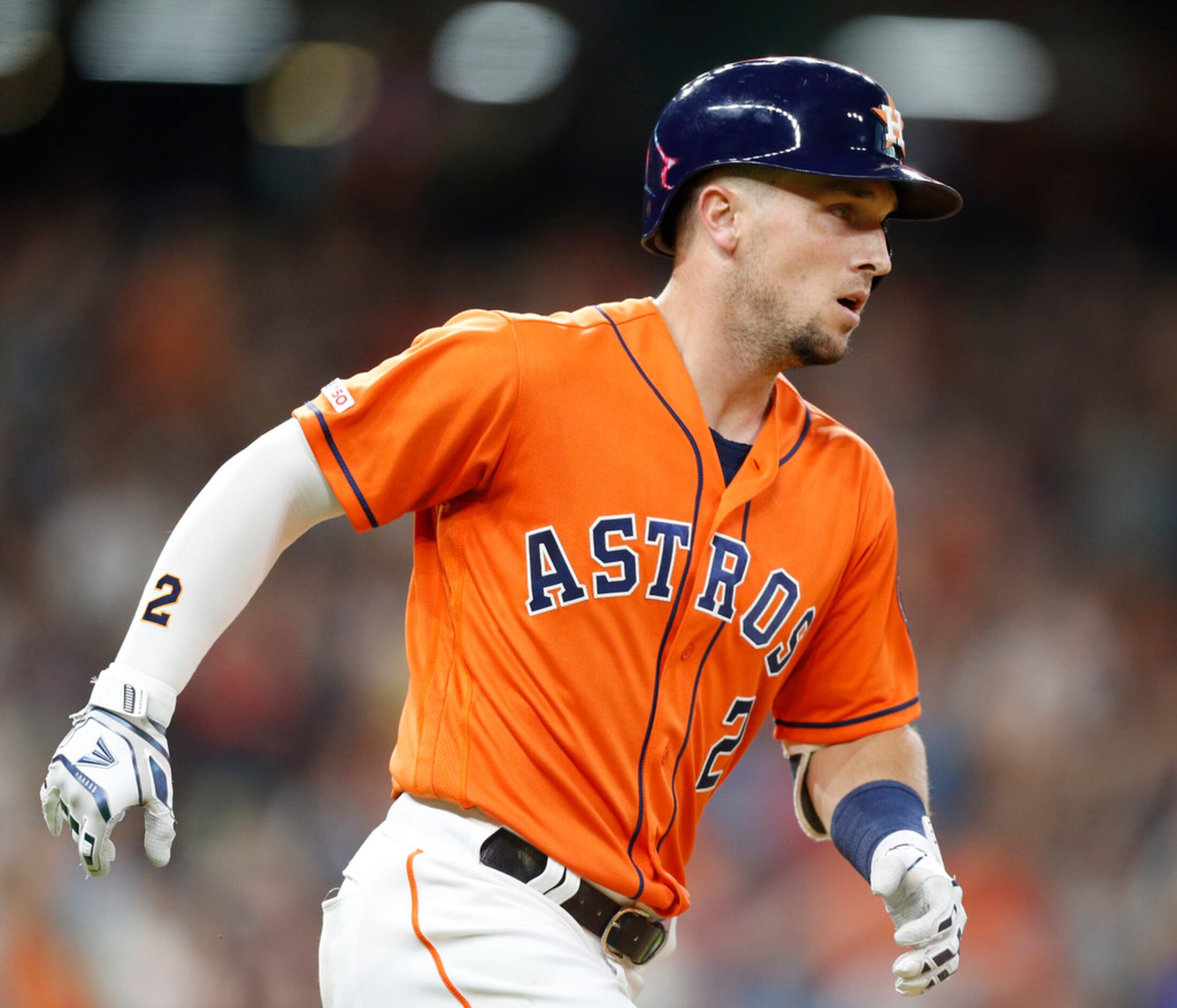 HOUSTON, TEXAS - JULY 19: Alex Bregman #2 of the Houston Astros hits a home run in the third...