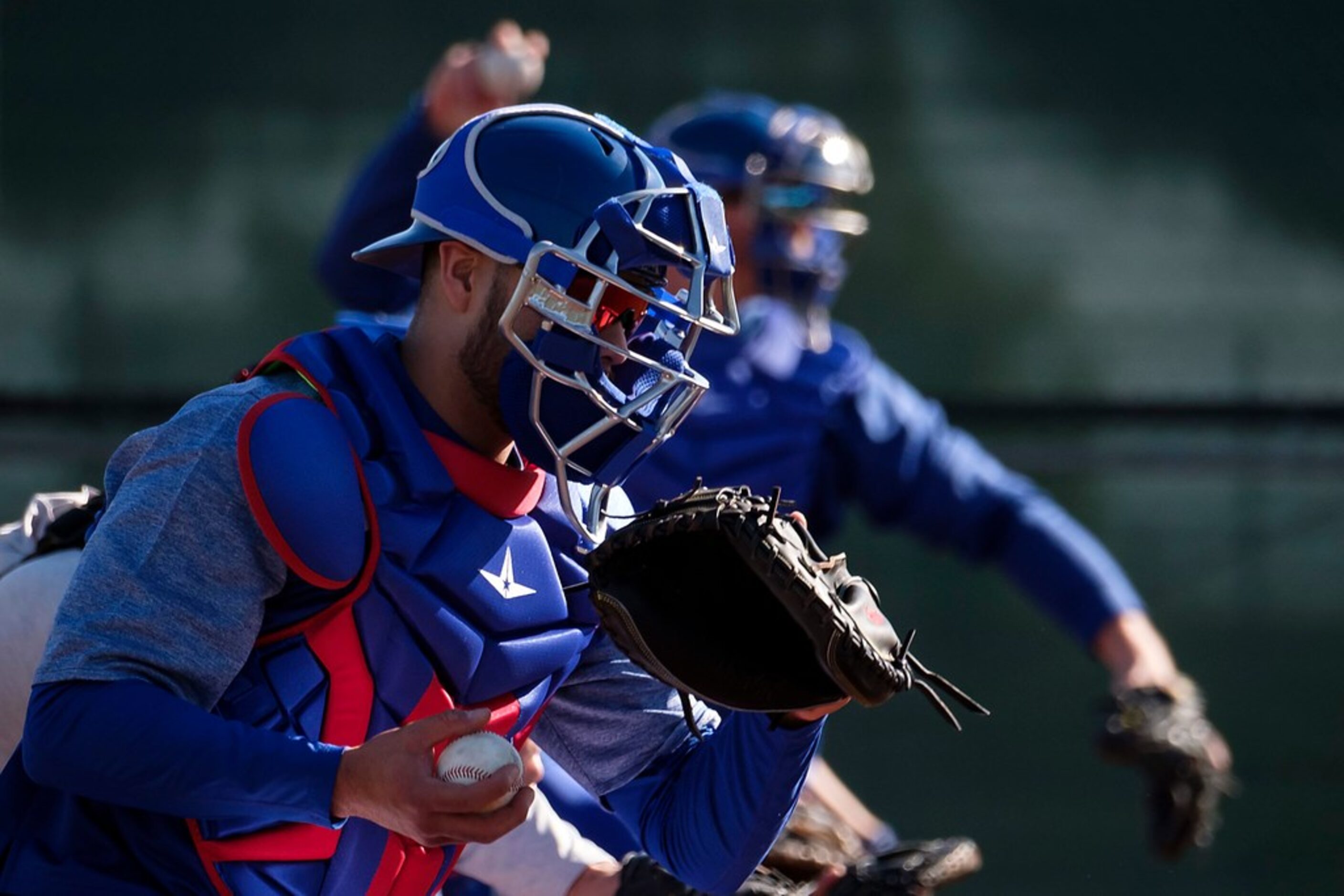 Texas Rangers Isiah Kiner-Falefa works in the bullpen after pitchers and catchers reported...