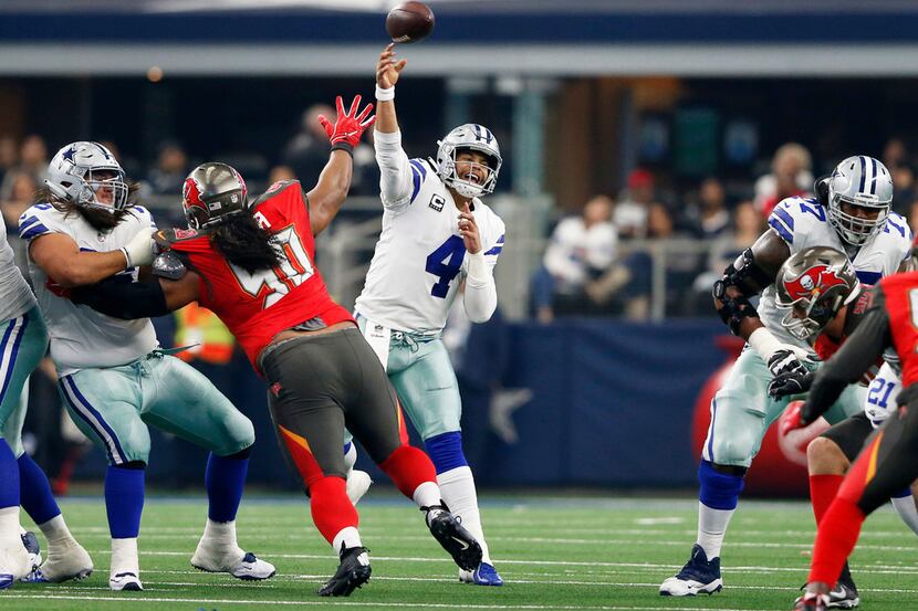 Dallas Cowboys quarterback Dak Prescott (4) attemtps a pass as Dallas Cowboys offensive...