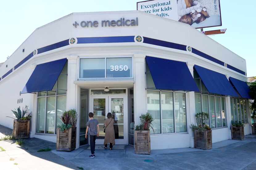 Patients enter a One Medical office in Oakland, Calif. Amazon said in July that it would...
