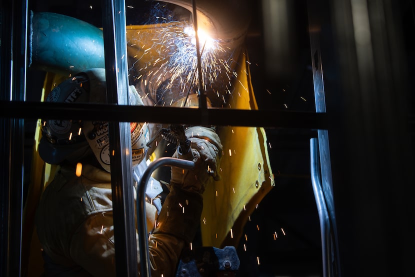 Cameron Fay welds a pipe as construction continued on Metrocare’s new Oak Cliff clinic in...