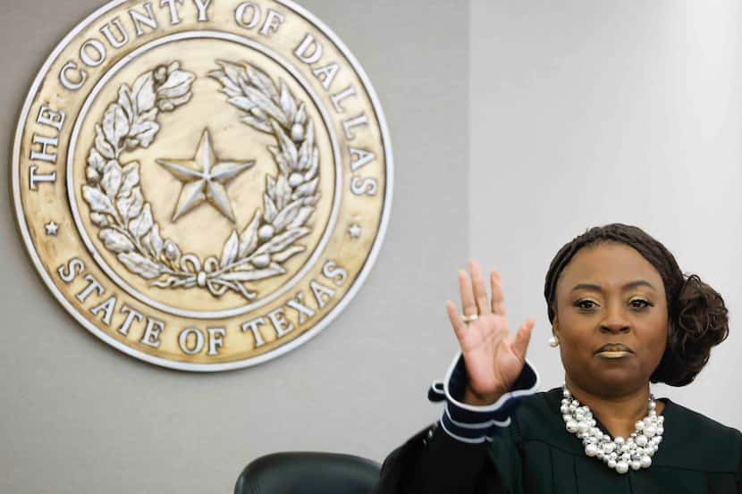 203rd District Court Judge Raquel "Rocky" Jones returns to the courtroom after a recess on...