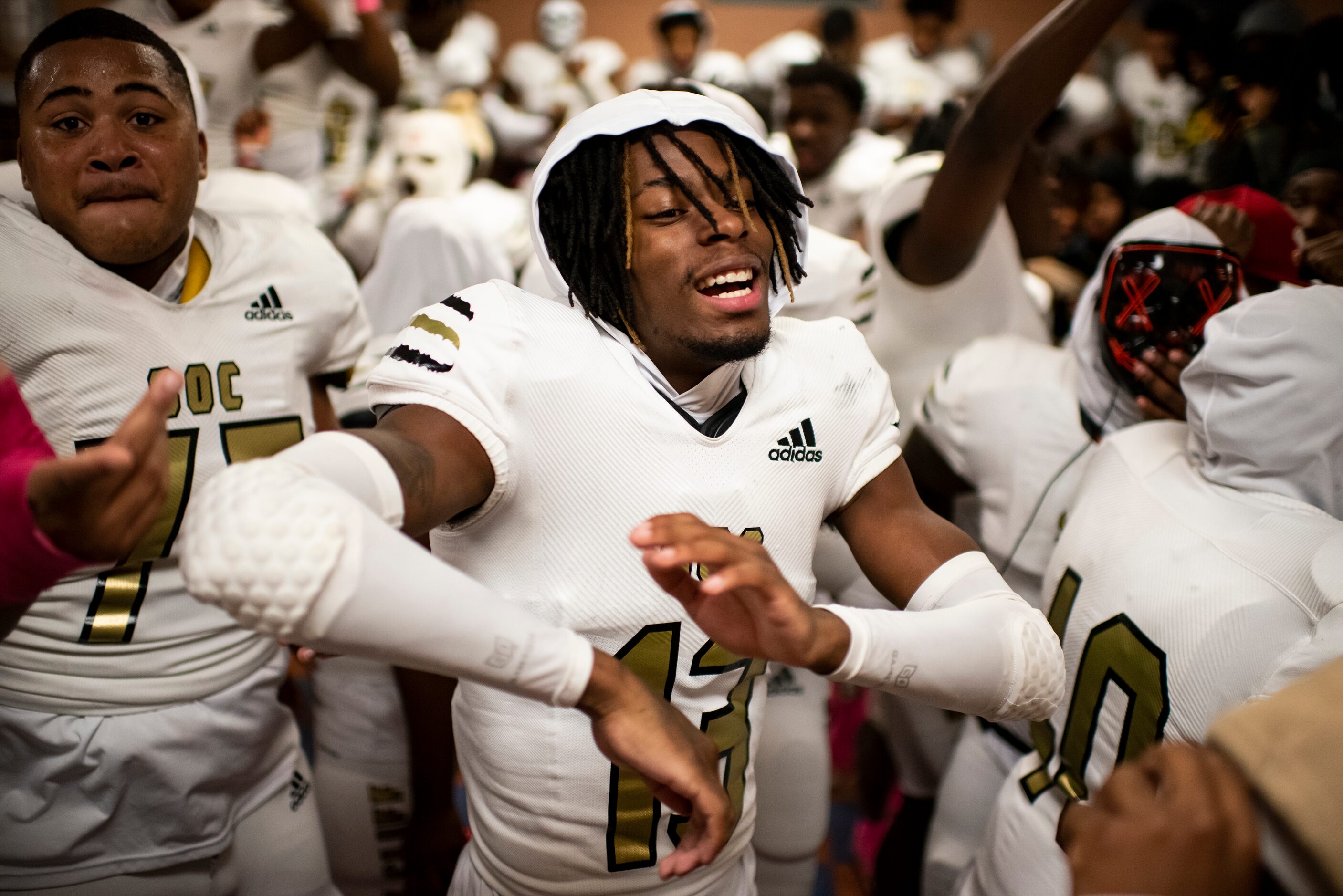 South Oak Cliff junior Taylor Starling (13) celebrates with his teammates during halftime of...