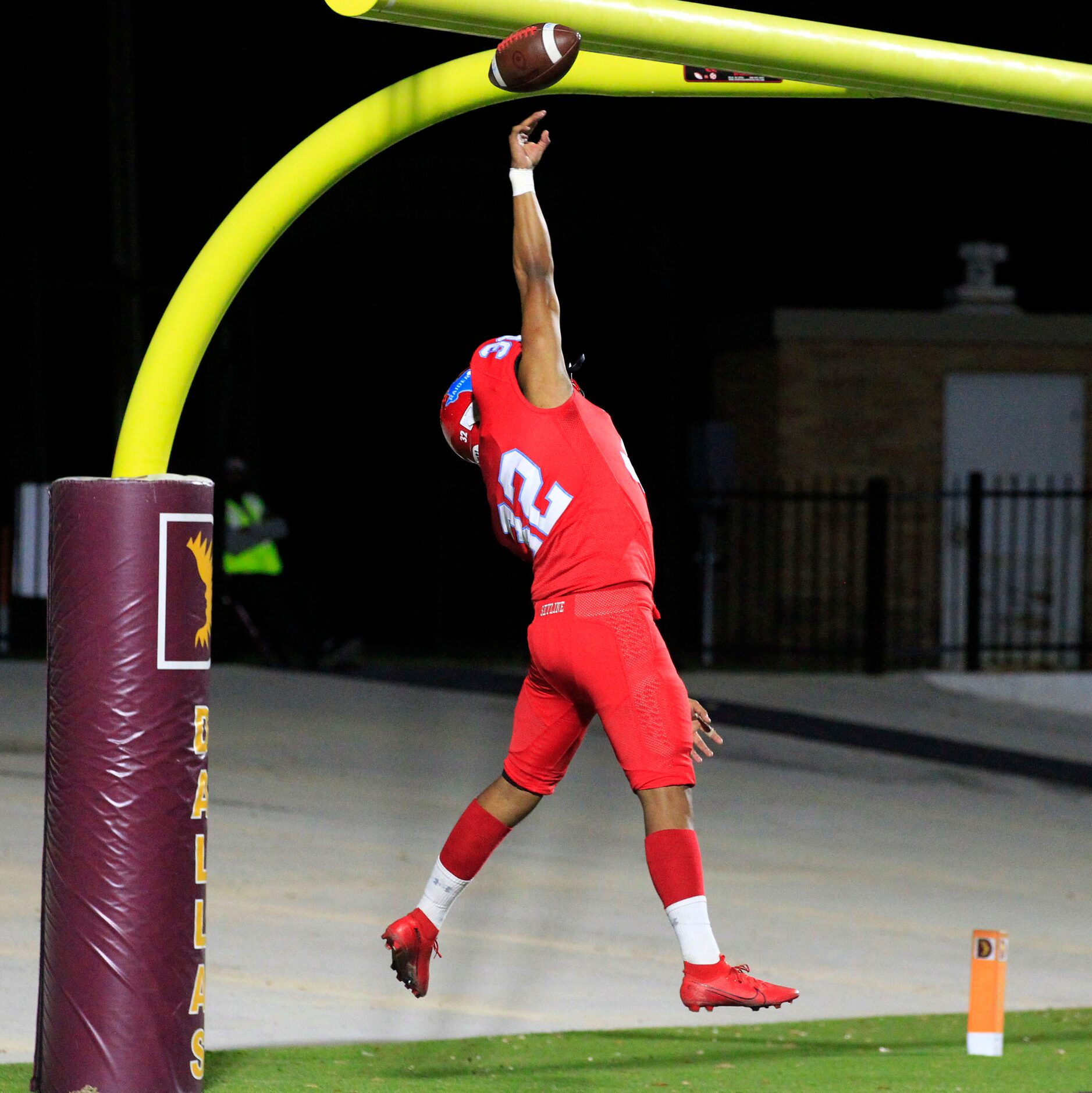 A high snap is fielded by Skyline punter Tyre Terry (12), who came down with it...