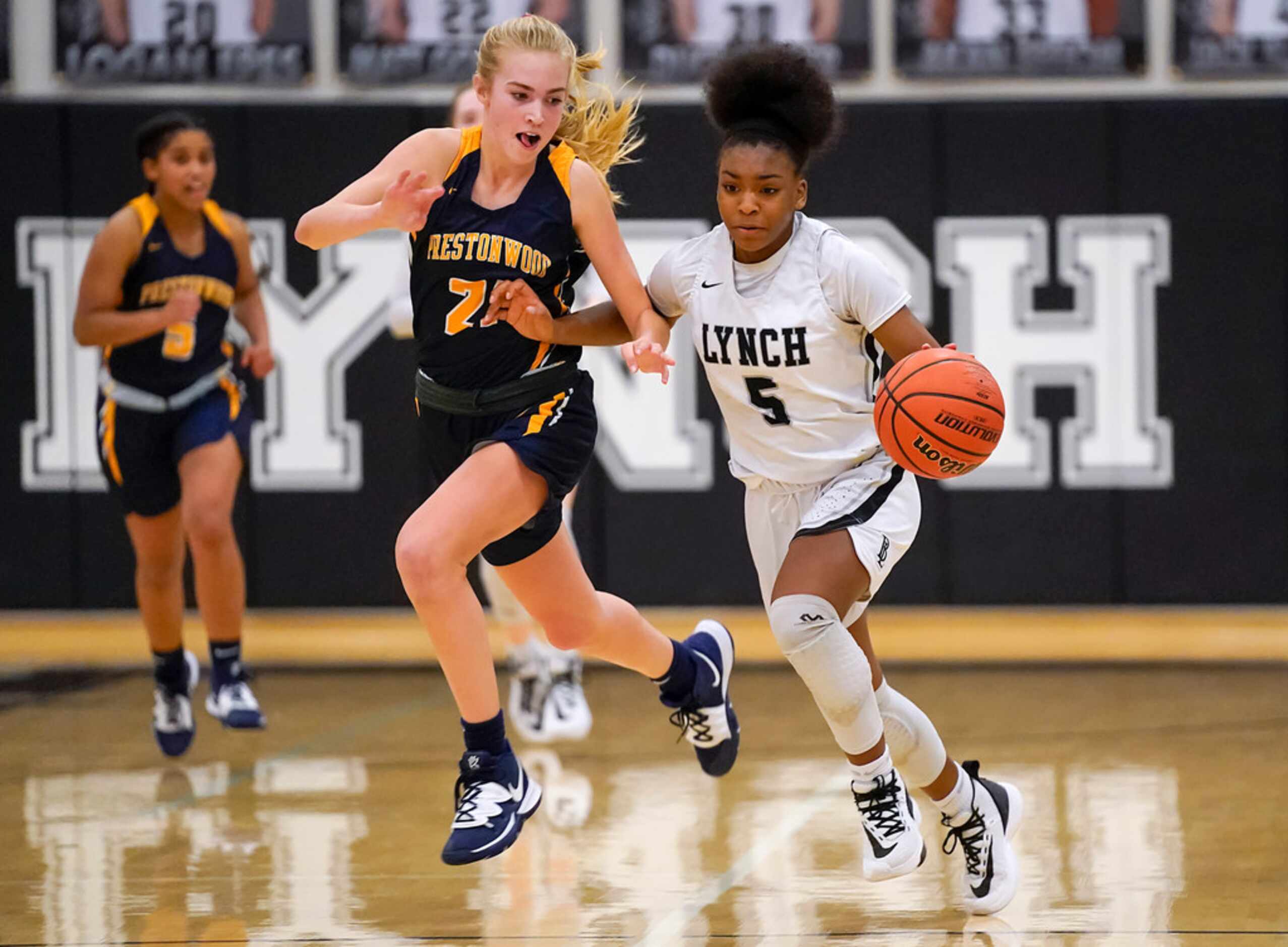 Bishop Lynch guard Maddie Cockrell (5) brings the ball up the floor as Prestonwood Christian...