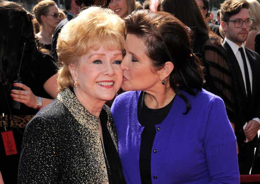 Debbie Reynolds (left) and Carrie Fisher arrive at the Primetime Creative Arts Emmy Awards...