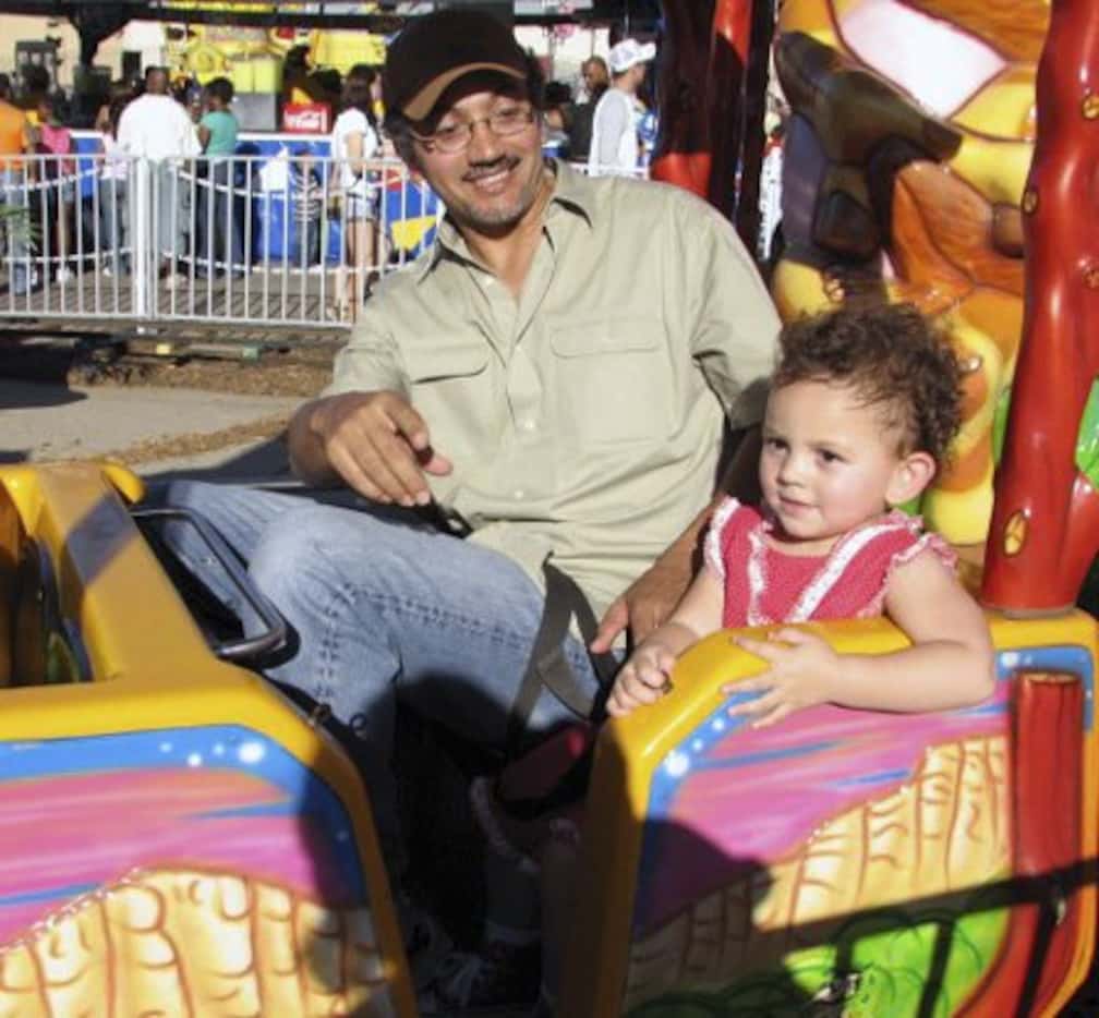 Metro columnist James Ragland with daughter Selah at State Fair of Texas in  2008.