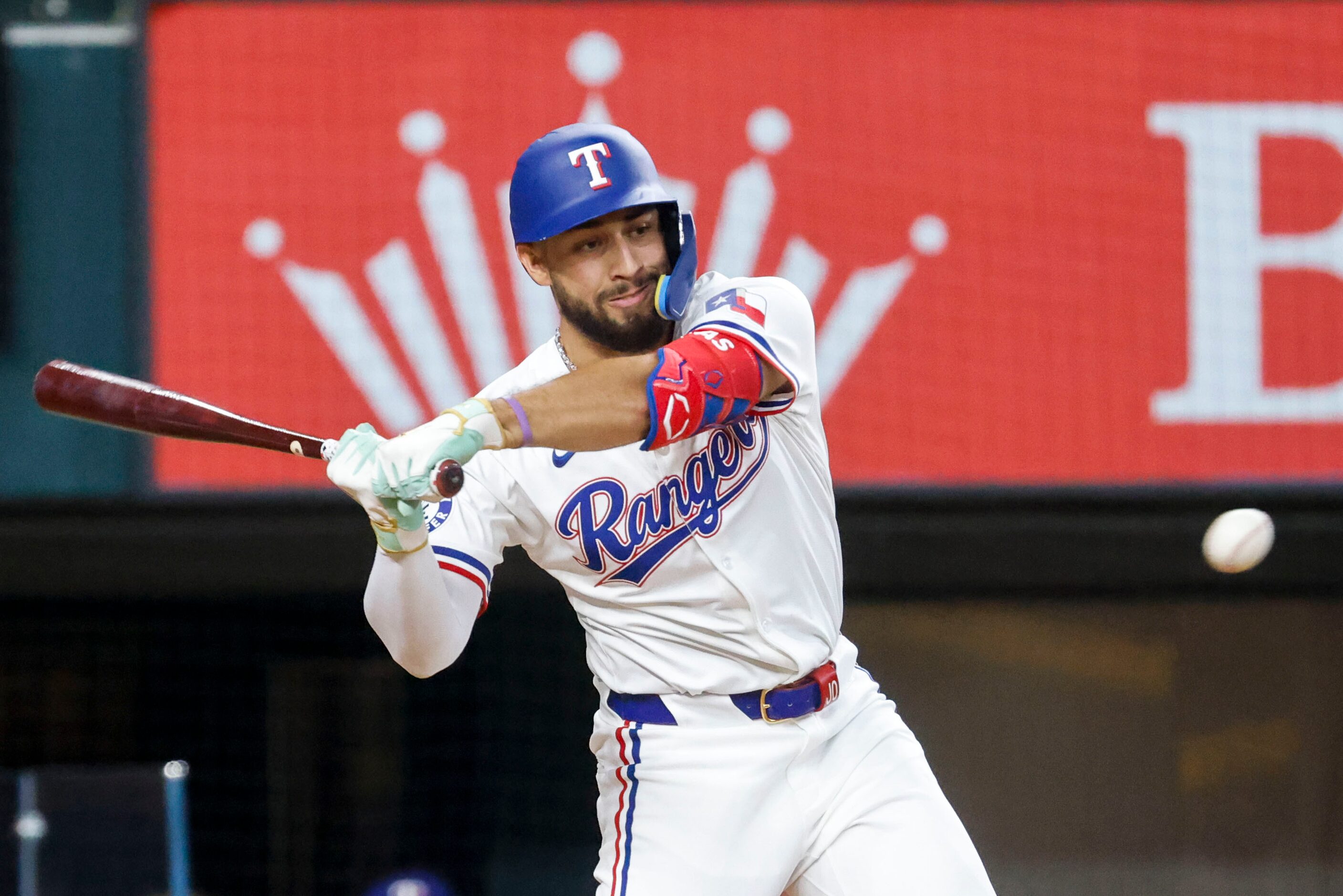 Texas Rangers third base Jonathan Ornelas attempts to hit during the second inning of a...