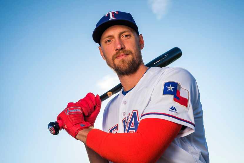 Texas Rangers outfielder Hunter Pence poses for a photograph during spring training photo...