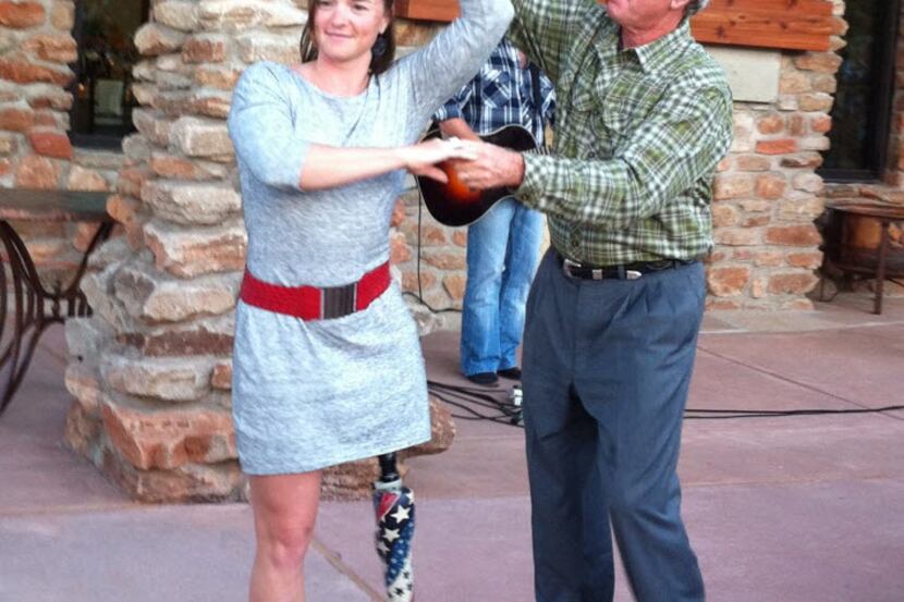 George W. Bush danced with retired Army 1st Lt. Melissa Stockwell at a dinner party April...