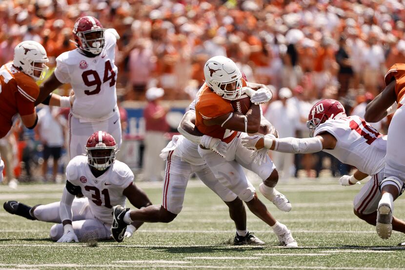 Texas Longhorns running back Roschon Johnson (2) carries the ball against the Alabama...