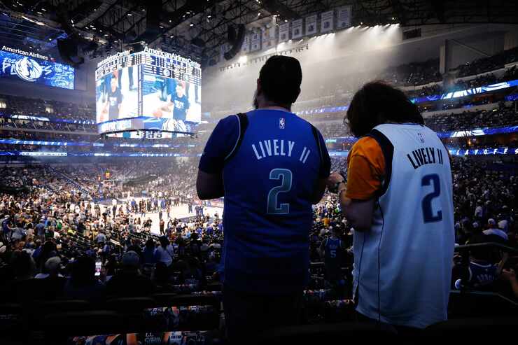 Dallas Mavericks fans wait for team introductions before Game 4 of the Western Conference...