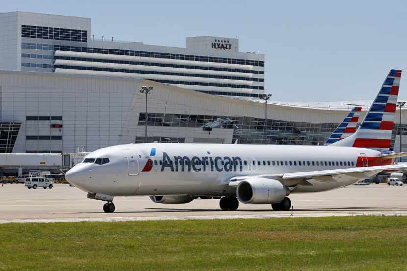  An American Airlines jet taxis at Dallas/Fort Worth International Airport. (Tom Fox/The...