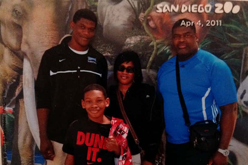 An 18-year-old Randy Gregory, left, with his mother Mary, father Kenneth and younger brother...
