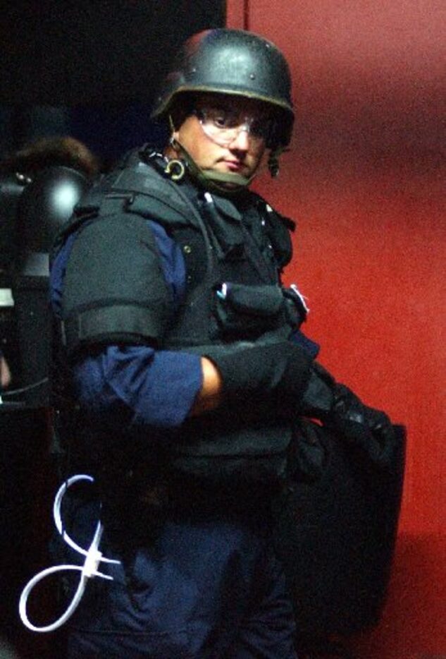 Dr. Alex Eastman was all suited up during a raid at The Gentleman's Club on May 12, 2005....