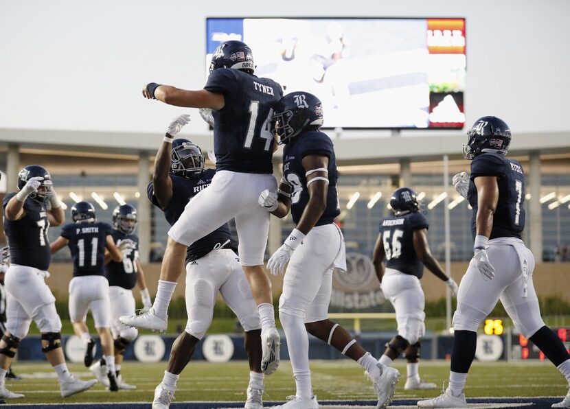 HOUSTON, TX - SEPTEMBER 23:  Jackson Tyner #14 of the Rice Owls celebrates with Austin...