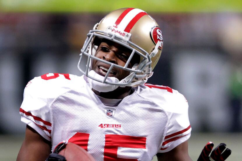 ORG XMIT: MOJR105 San Francisco 49ers wide receiver Michael Crabtree celebrates as he runs...