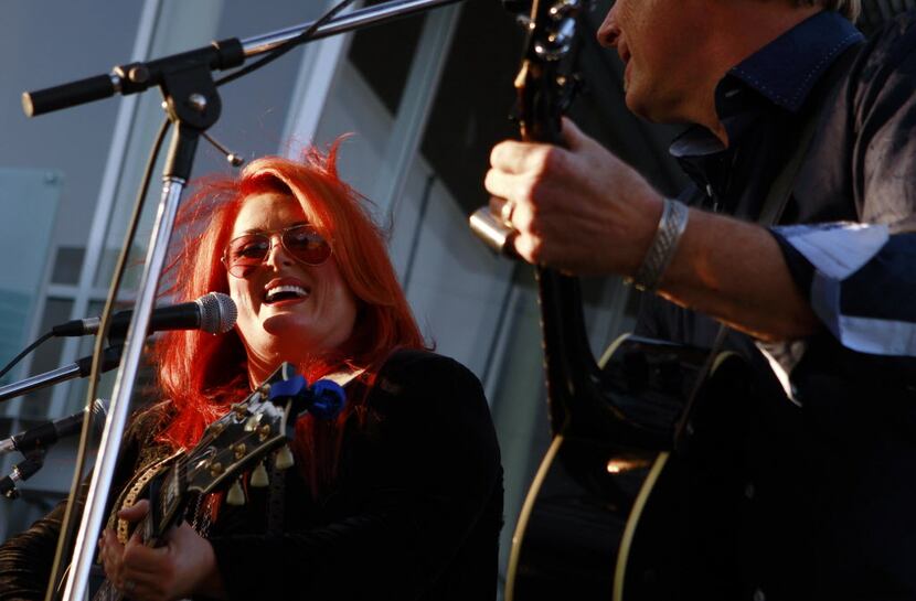 Wynonna Judd and her husband Cactus Moser perform during the red carpet event for the...