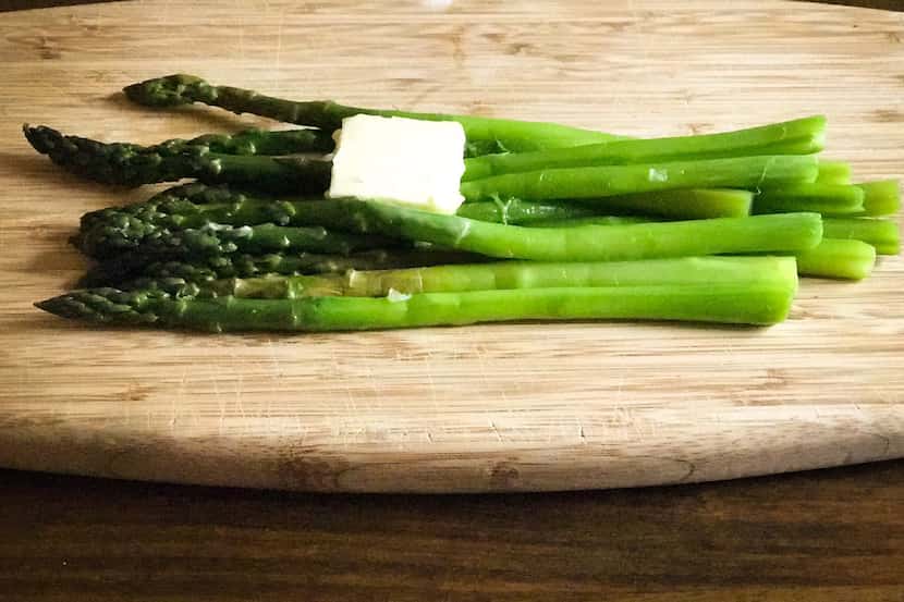 Warm buttered asparagus: The key is peeling the spears and cooking them long enough to...