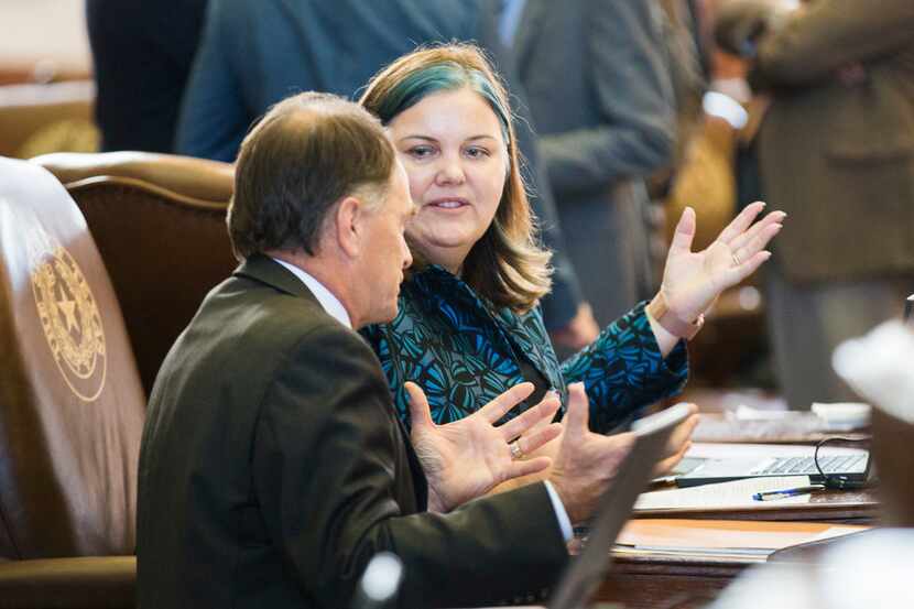 State Rep. Michelle Beckley talks with a colleague on the second day of the 86th Texas...