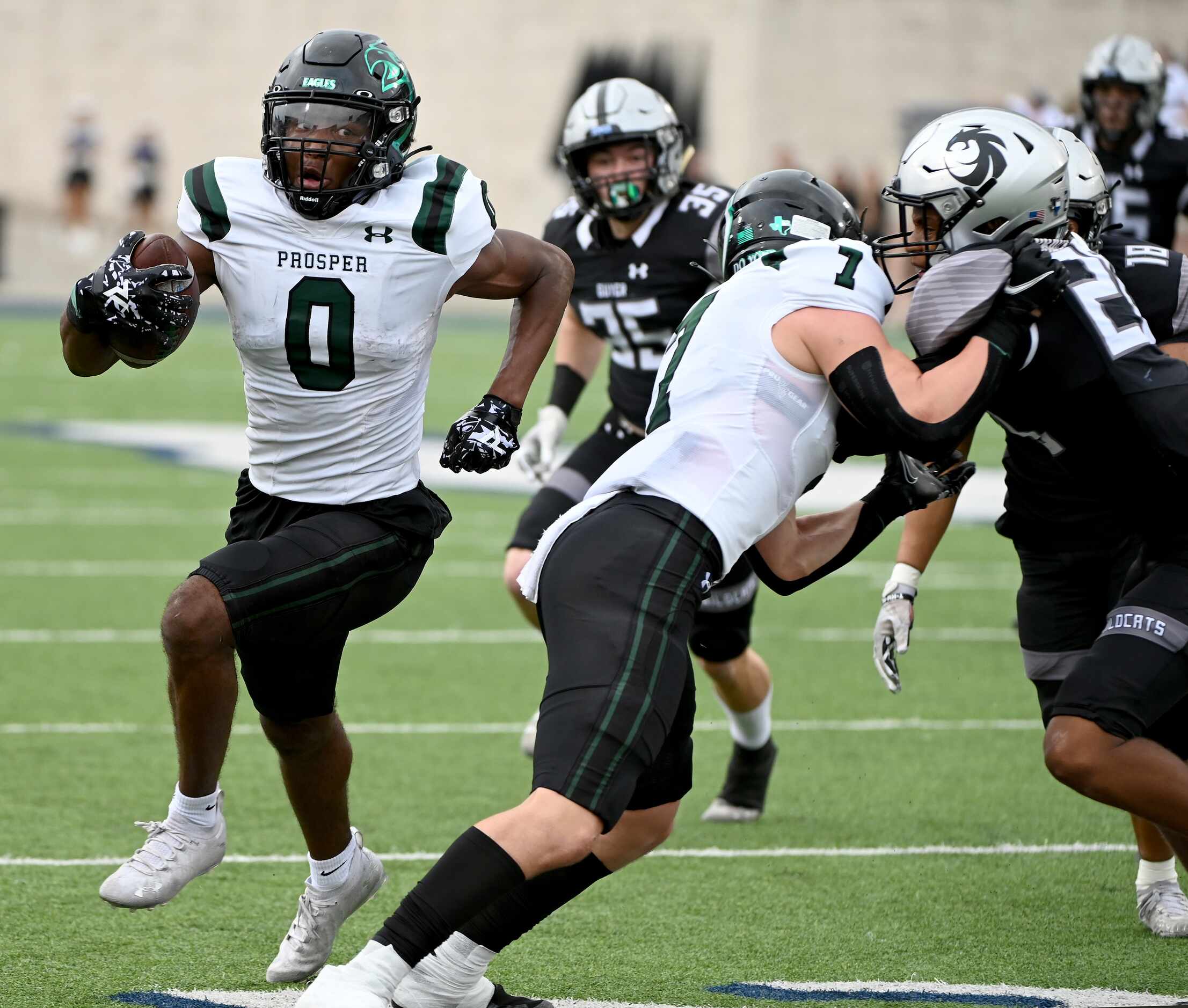Prosper's Tyler Bailey (0) runs for a touchdown in the first half of a Class 6A Division II...