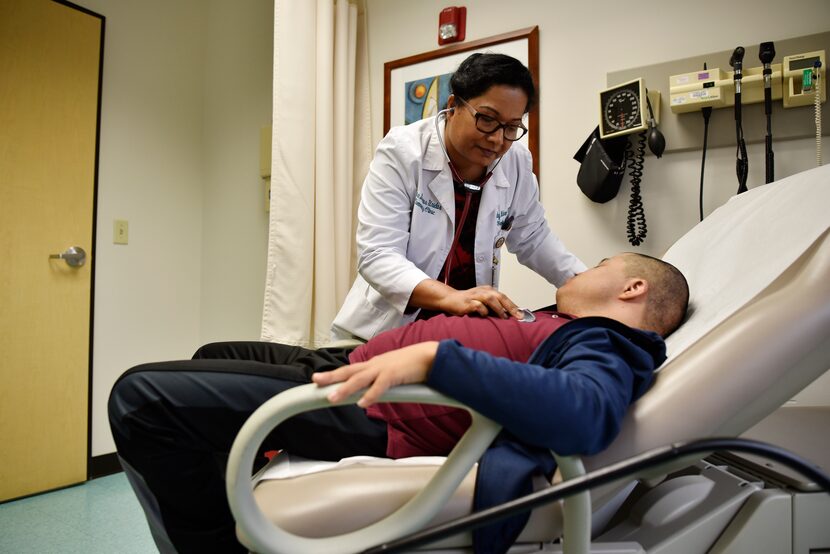 Nurse Practitioner Jhudy Mohan  examined 21-year-old Roberto Martinez during his visit to...