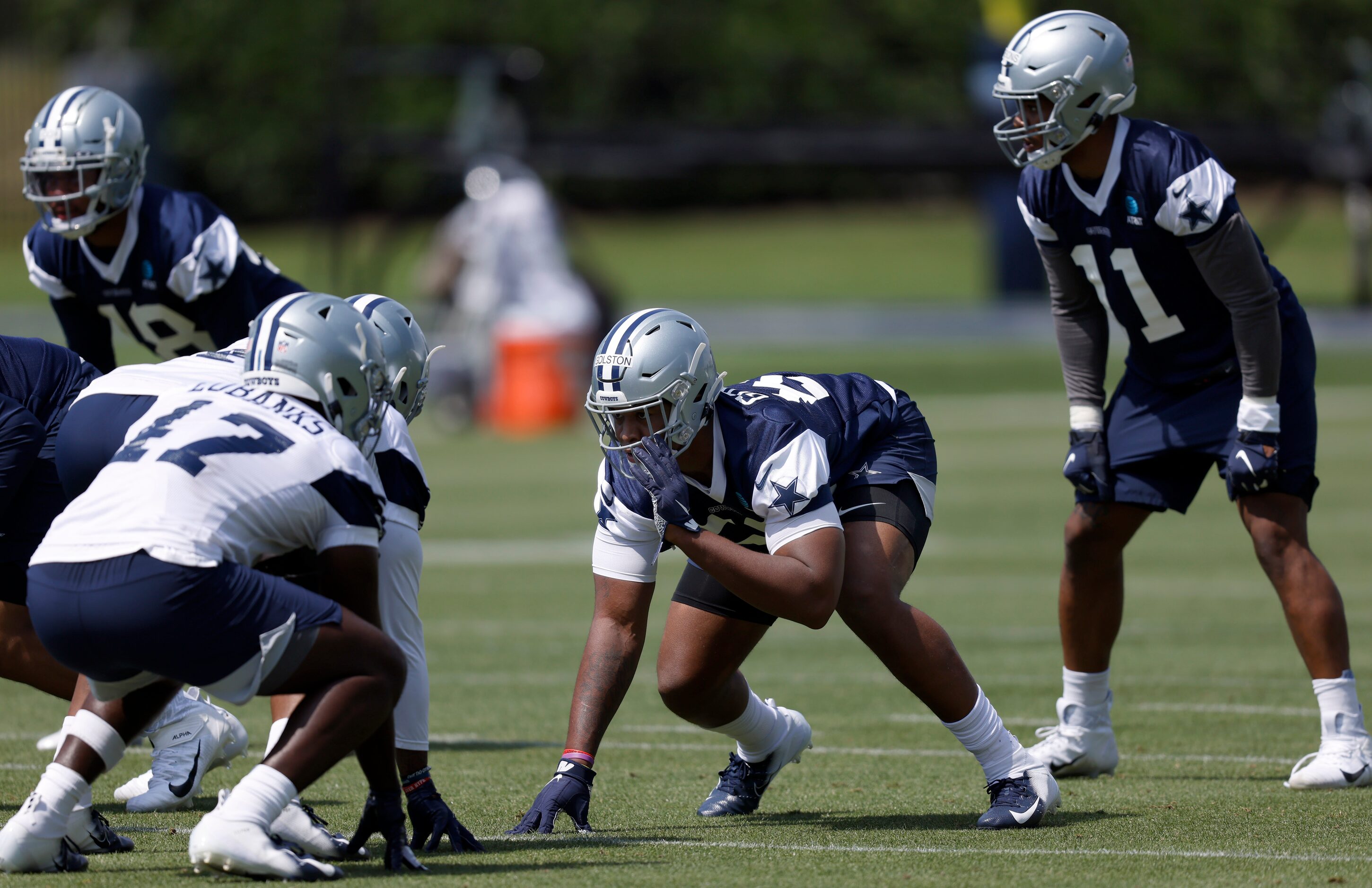 Dallas Cowboys rookie defensive end Chauncey Golston (59) and rookie linebacker Micah...