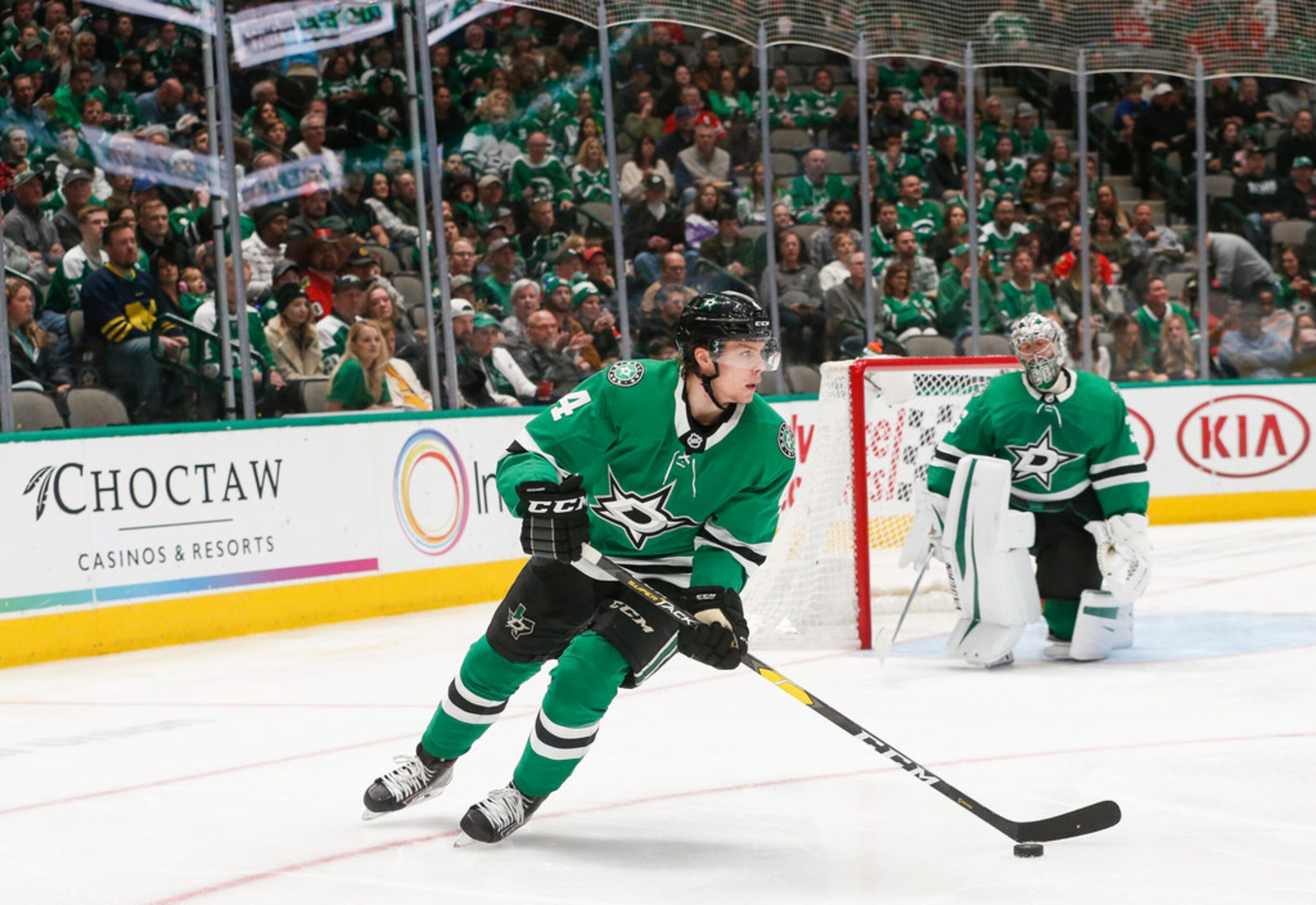 Dallas Stars defenseman Miro Heiskanen (4) moves the puck during the second period of an NHL...