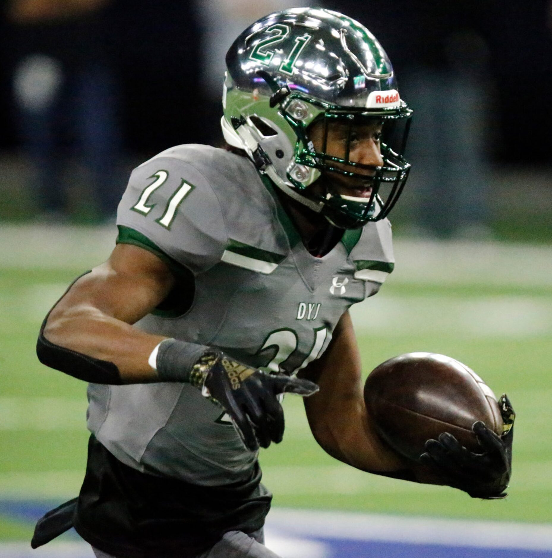 Prosper High School defensive back Jorden Miles (21) runs after and interception, to score a...