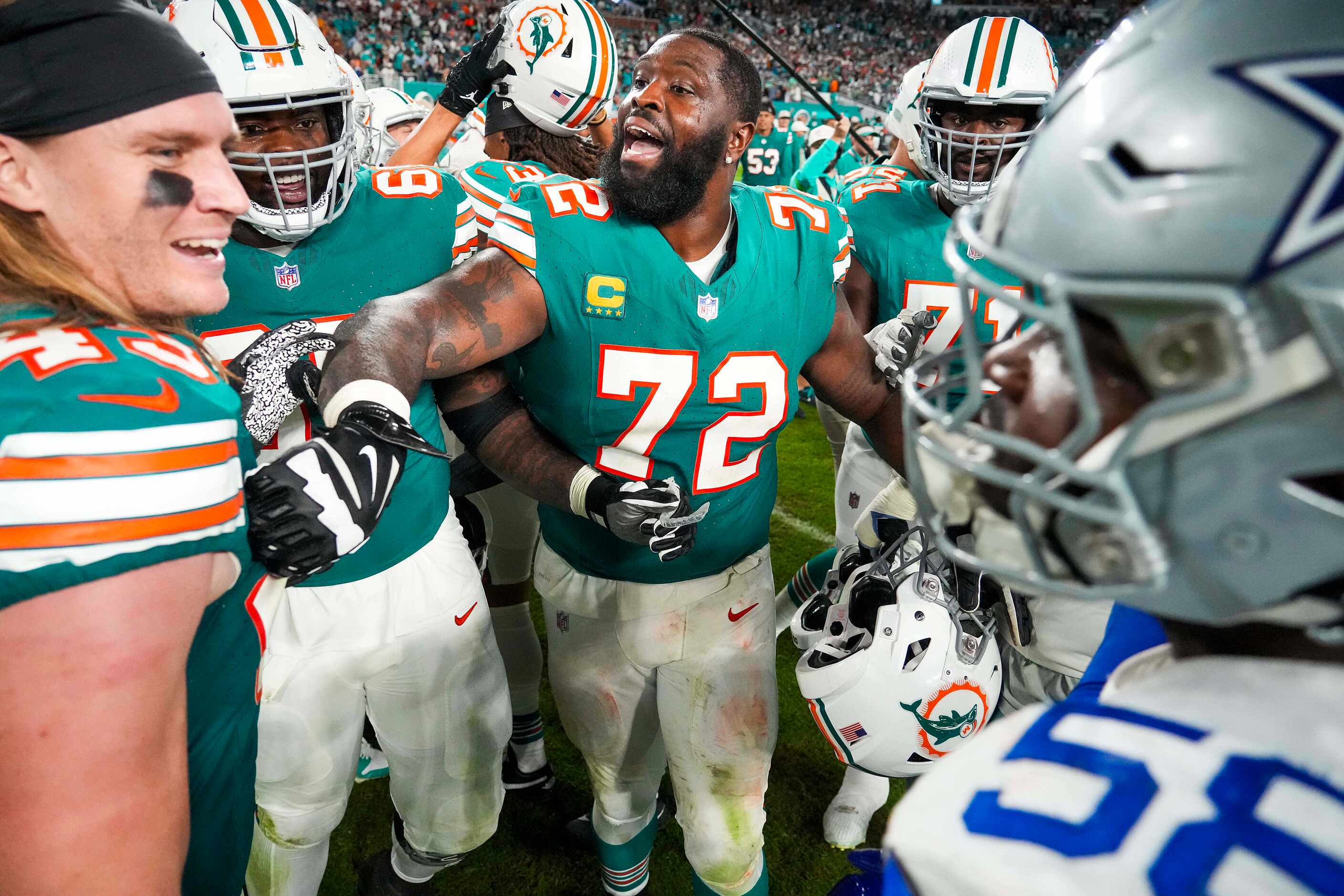 Miami Dolphins offensive tackle Terron Armstead (72) tries to separate linebacker Andrew Van...