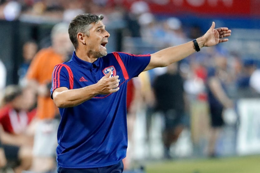 FC Dallas head coach Luchi Gonzalez instructs his team during a defensive transition in the...