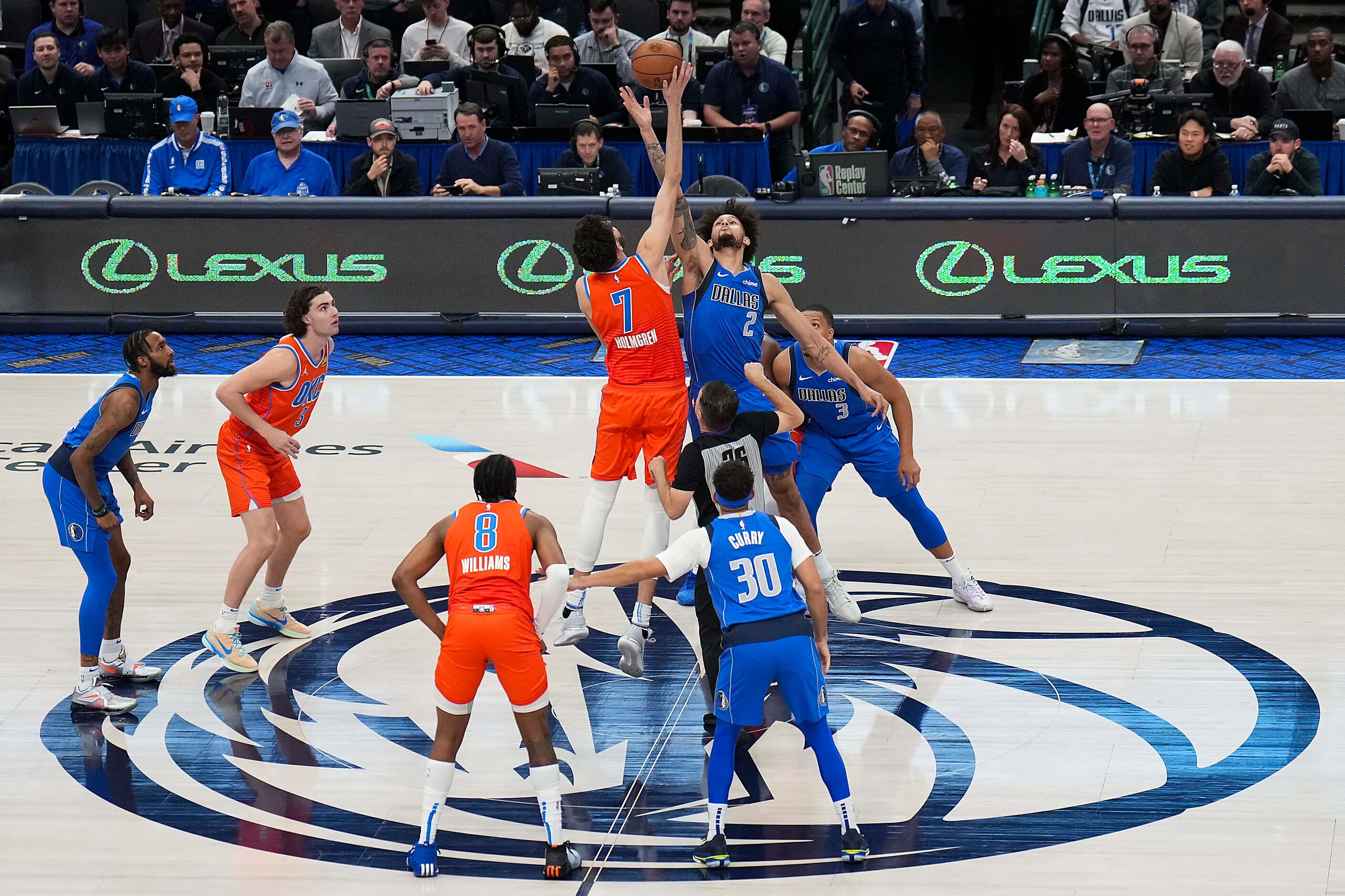 Dallas Mavericks center Dereck Lively II (2) goes for the opening tipoff against Oklahoma...