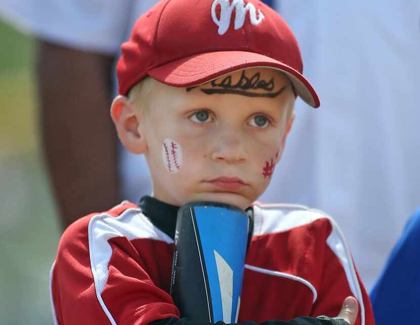 
Keagan Nash, 6, waits his turn in the 6-year-old home run derby at Mesquite's Valley Creek...