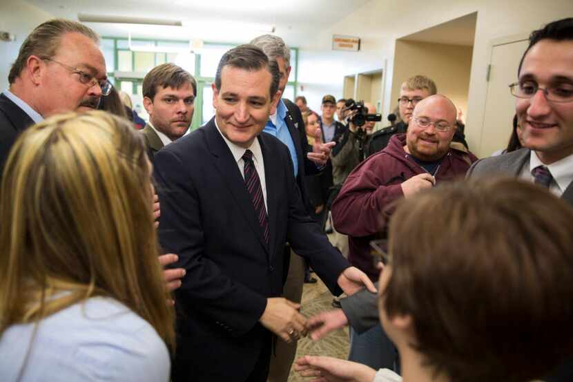  Sen. Ted Cruz (signs autographs as he meets voters during the Iowa Faith & Freedom...