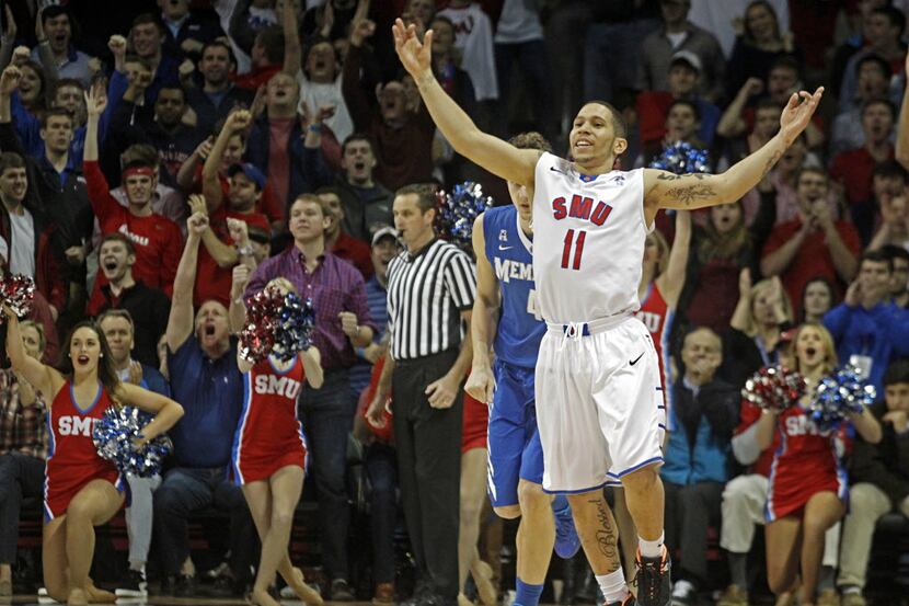 Southern Methodist guard Nic Moore (11) celebrates a three-point shot against Memphis during...