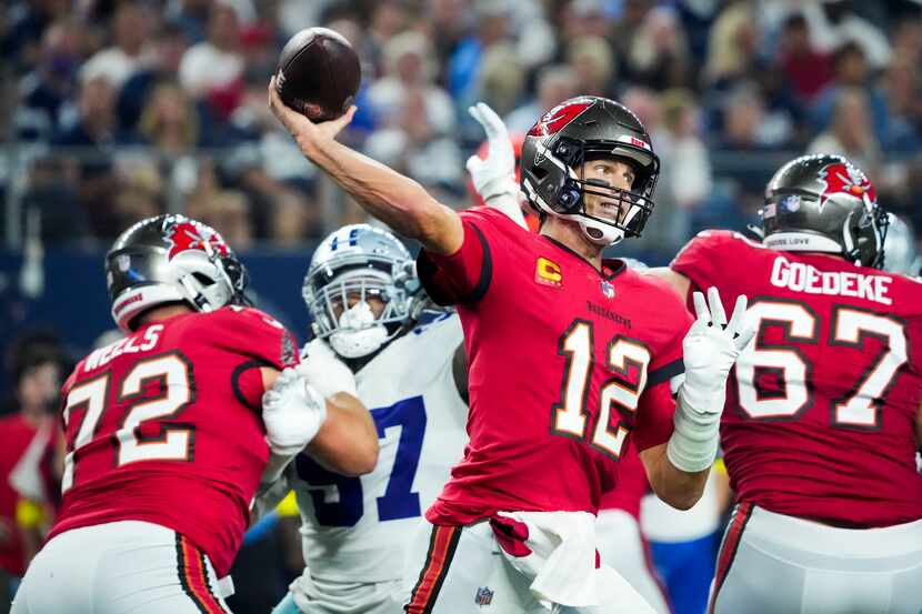 Tampa Bay Buccaneers quarterback Tom Brady (12) throws a pass as Dallas Cowboys defensive...