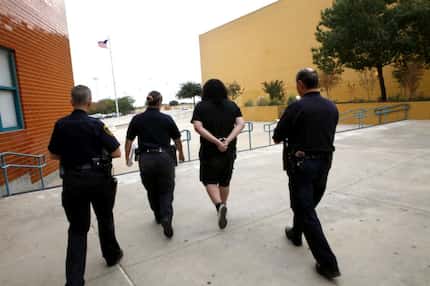 A 15-year-old student is taken from a Dallas high school to a Dallas County truancy court....