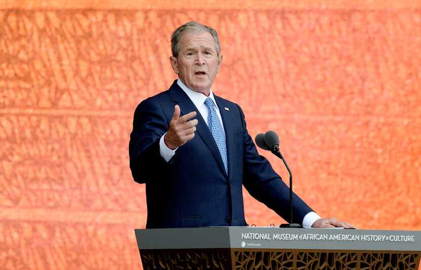 Former President George W. Bush speaks at the opening ceremony at the opening ceremony of...