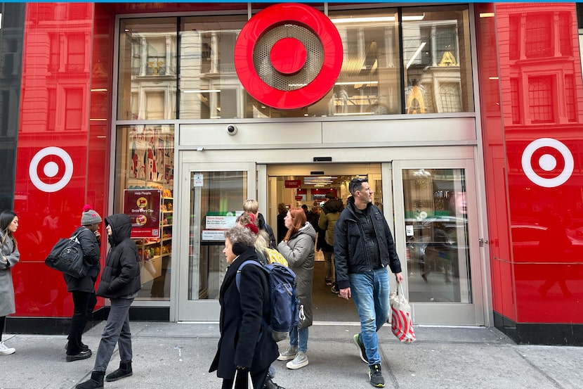 Shoppers leave a Target store in midtown Manhattan in New York on Tuesday, March 19, 2024....