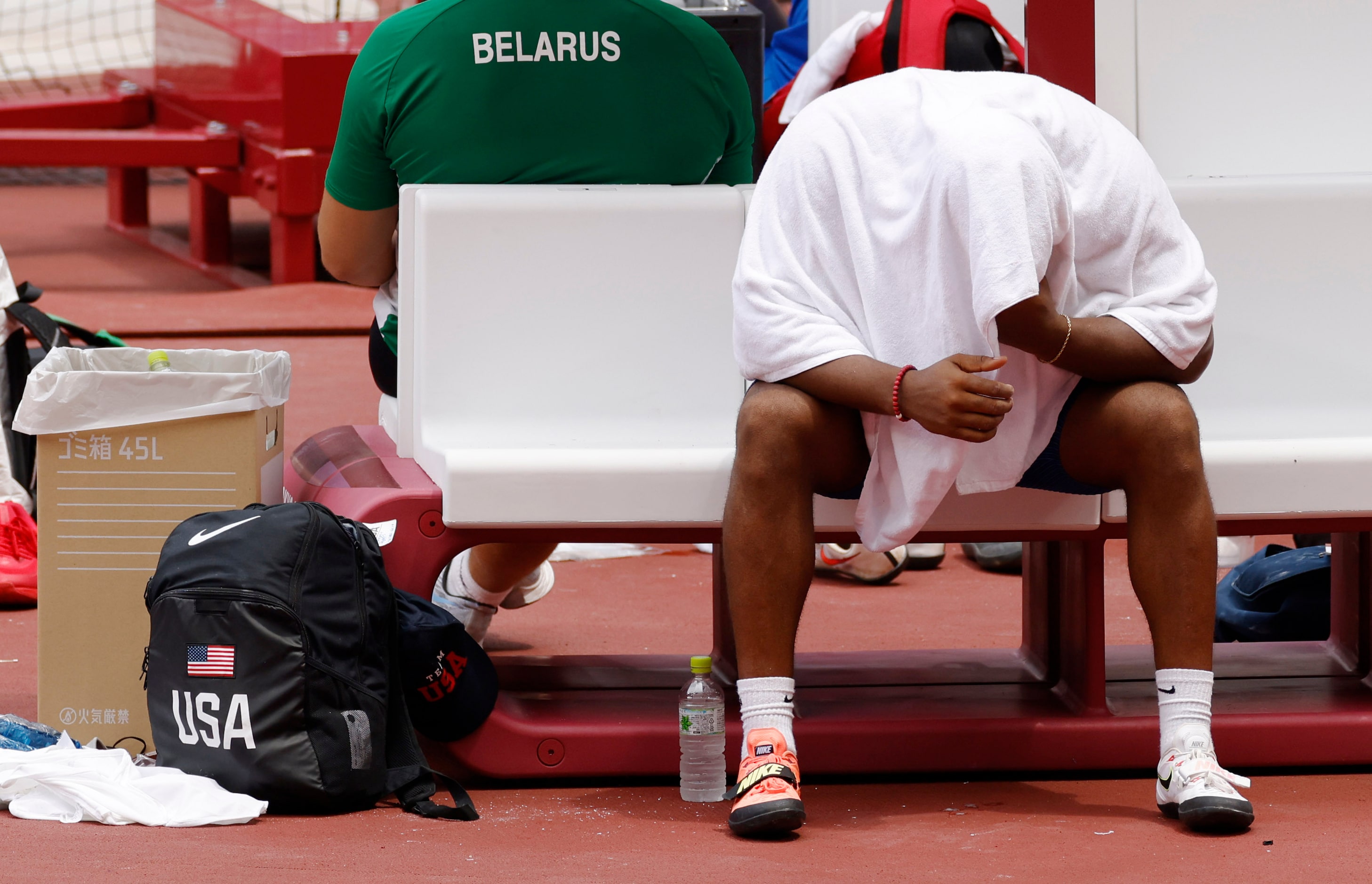 USA’s Reggie Jagers III sits dejected on the bench after not qualifying for the next round...