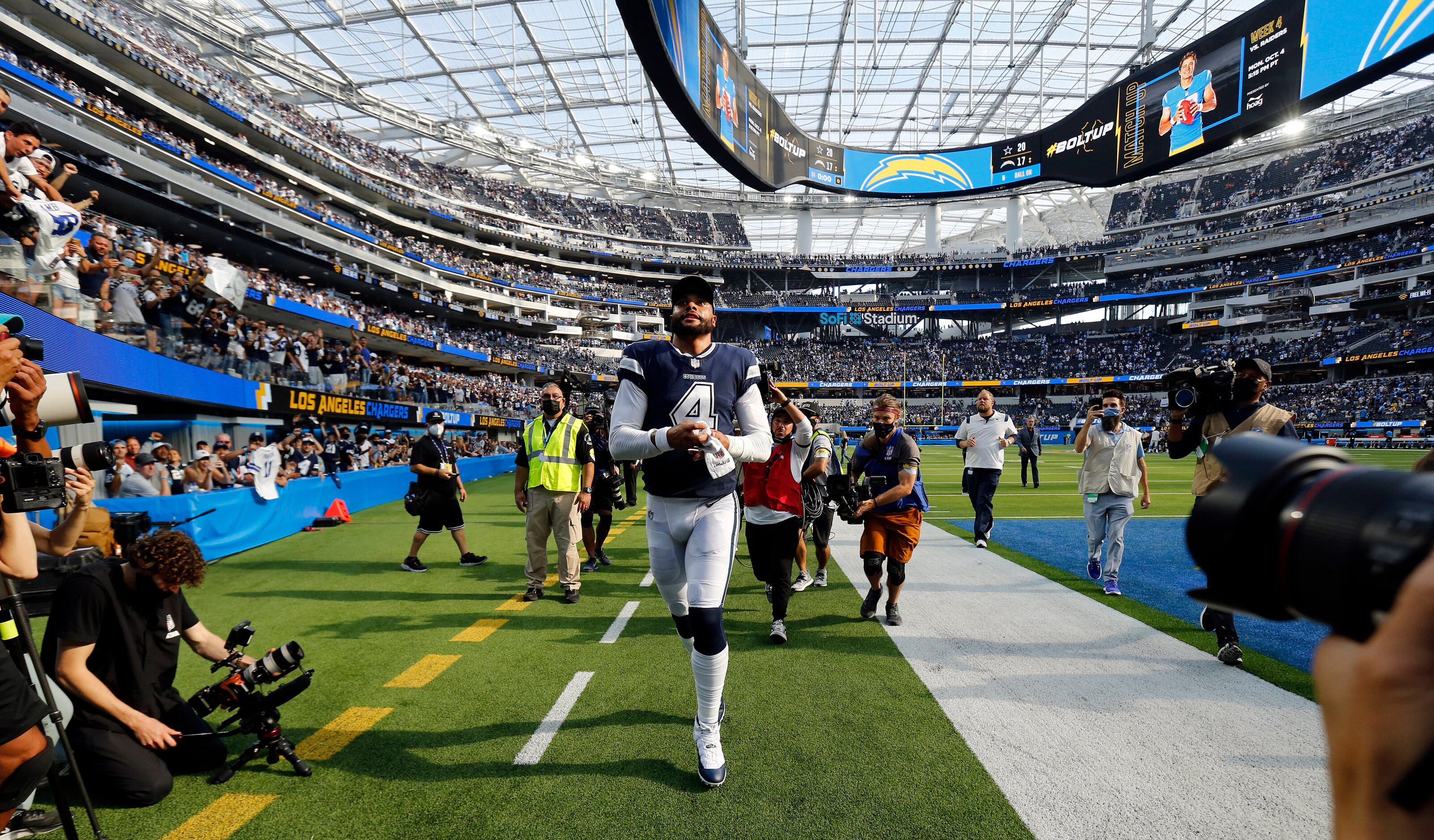 Dallas Cowboys quarterback Dak Prescott (4) runs off the field after their win over the Los...