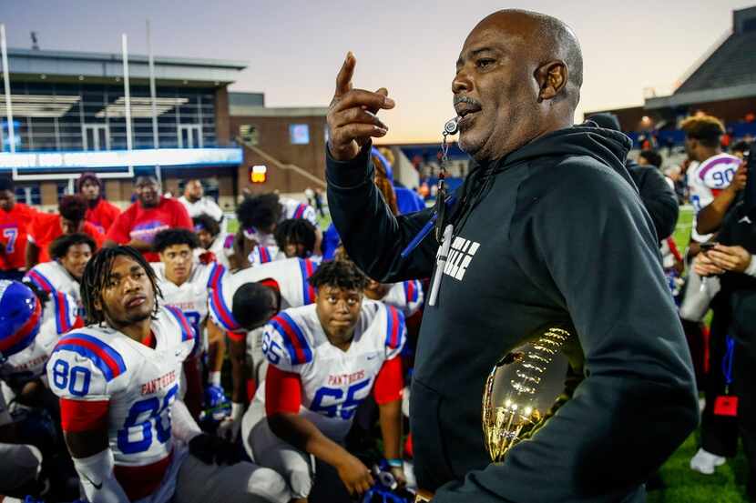 Duncanville Panthers head coach Reginald Samples speaks to his team after a win over...